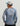 Child wearing gray and blue tie-dye long-sleeve crew with circular boat logo on back, paired with white and blue baseball cap
