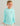 Child wearing light blue long-sleeve crew neck shirt with United Anglers Club circular logo on chest.