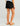 Huk youth Girls Pursuit Volley Swim Short in Black, 4-way stretch fishing shorts, back view