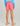 Huk youth Girls Pursuit Volley Swim Short in Neon Coral, 4-way stretch fishing shorts, back view