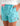Huk youth Girls Pursuit Volley Swim Short in Caicos Palm Play, 4-way stretch fishing shorts, front view, alternate angle