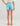Huk youth Girls Pursuit Volley Swim Short in Caicos Palm Play, 4-way stretch fishing shorts, side view