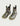 Pair of waterproof boots with gray and yellow wave print, tan calf collar, and striped pull-on handles.