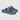 Slate blue clog-style slides with textured upper, cushioned footbed, and Huk branding on the heel.
