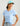 Light blue women's v-neck t-shirt with small yellow and white graphic logo on chest.